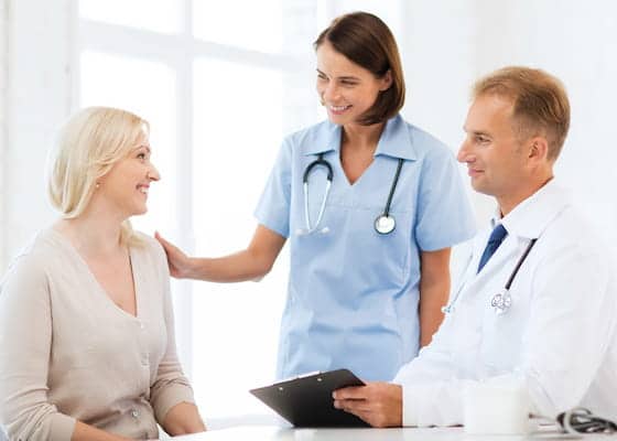 Doctor with patient in hospital